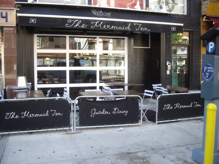 Glass Garage Doors for your New York City Restaurant or Storefront