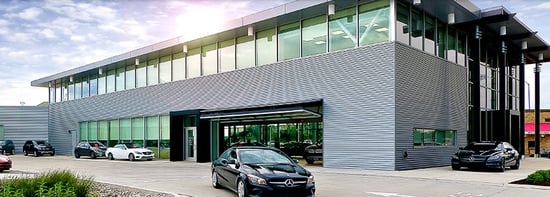 Canopy Type Bifold Doors at a car dealership