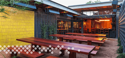 Canopy Type Bifold Garage Doors by Schweiss Doors - Hydraulic One Piece Door Installed in a Thai Restaurant in Austin, Texas