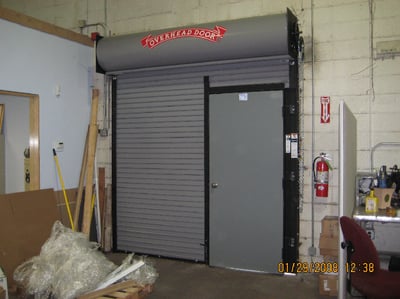 Sectional Door with Pass-Through Door; Gray Sectional Door with Pass-Through Door installation