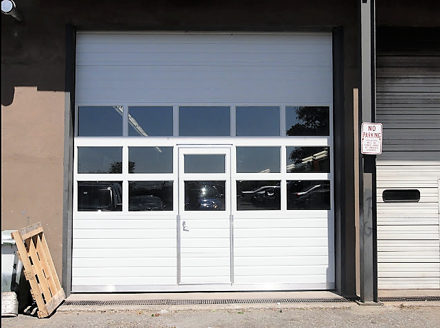Sectional Door with Pass-Through Door; White Sectional Door with Pass-Through Door and glass panels-1
