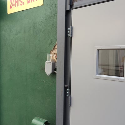 man_door_hinges_for_coiling_door_with_egress_nyc.jpg