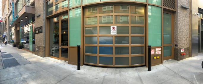 Homewood Suites hired us to install a beautiful and stylish aluminum glass garage door for their storefront retail loading dock.
